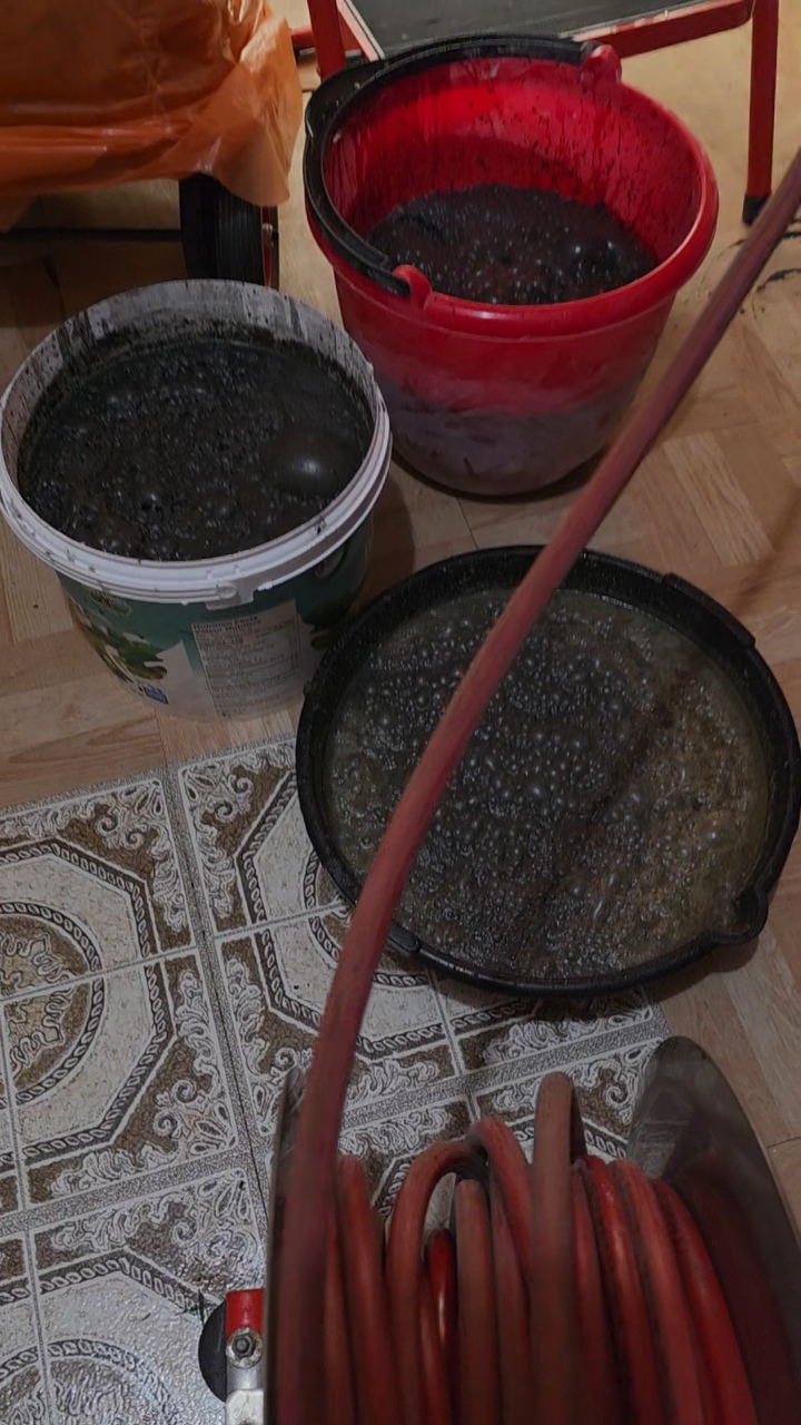 Greasy water and material recovered during drain cleaning